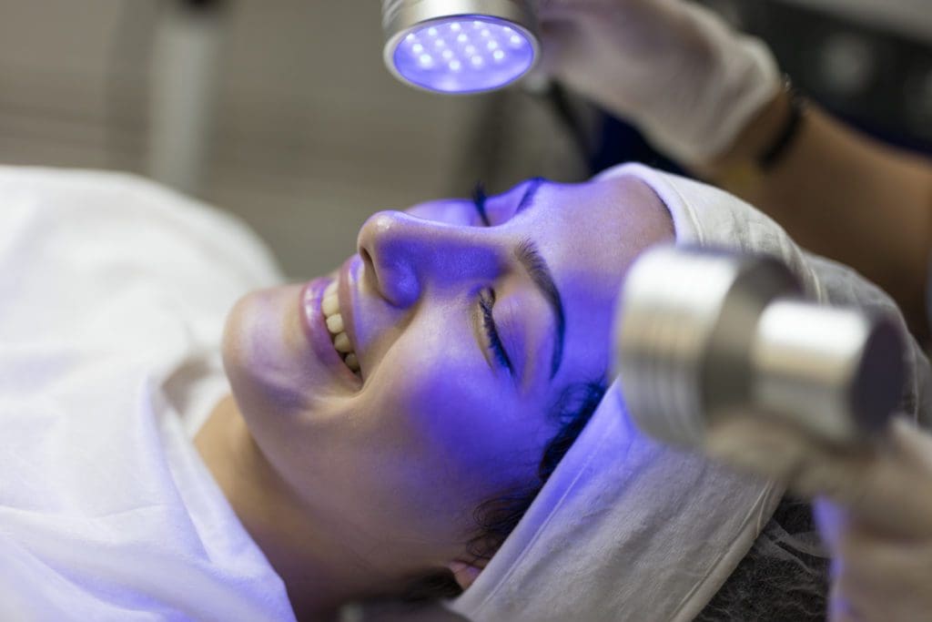 Female patient receiving LED light therapy