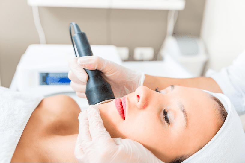 Patient receiving chin laser hair removal